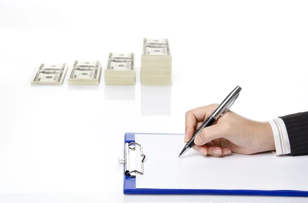 Business woman writing a note of a successful business — Stock Photo, Image