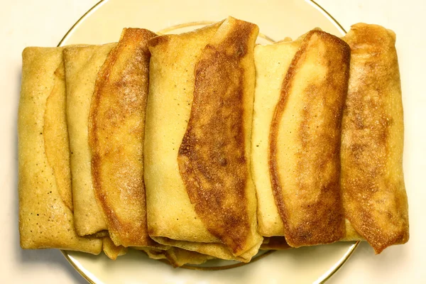 Russiske pandekager på en tallerken - Stock-foto