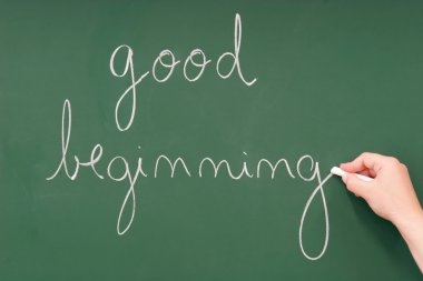 Good-beginning written on a blackboard clipart