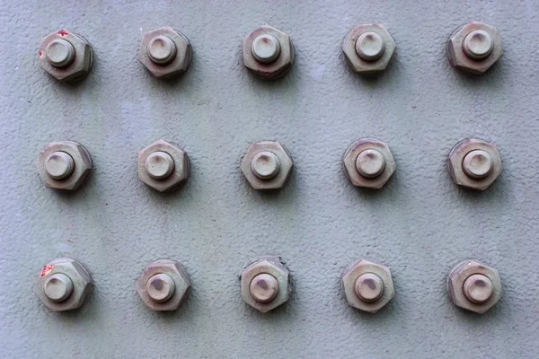 stock image Nuts And Bolts On Iron Plate