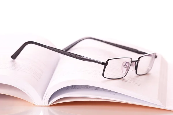 Glasses on a book — Stock Photo, Image