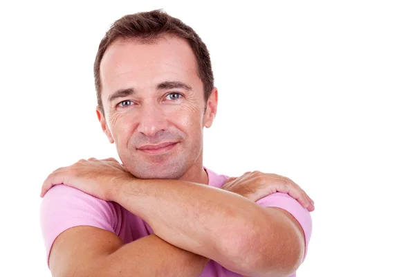 Portret van een knappe man van middelbare leeftijd, met gekruiste, op witte achtergrond armen. studio opname — Stockfoto