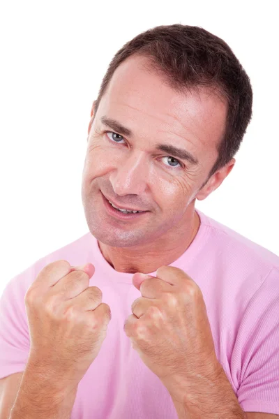 Smiling man punching fist isolated on white, studio shot — Stock Photo, Image
