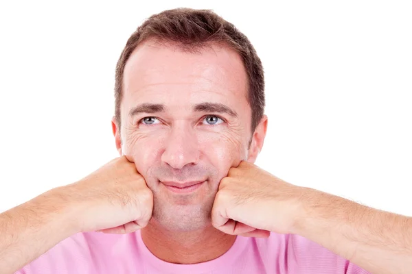 Retrato de un apuesto hombre de mediana edad, con las manos en la cara, mirando hacia arriba, sobre fondo blanco. Captura de estudio —  Fotos de Stock