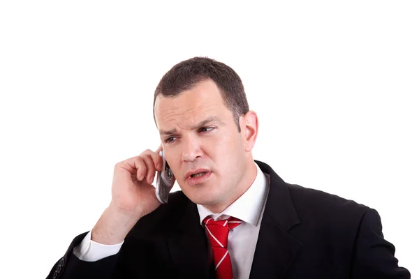Бізнесмен по телефону, ізольований на білому тлі — стокове фото