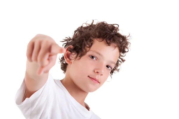 Cute Boy pointing, isolated on white, studio shot — Stock Photo, Image