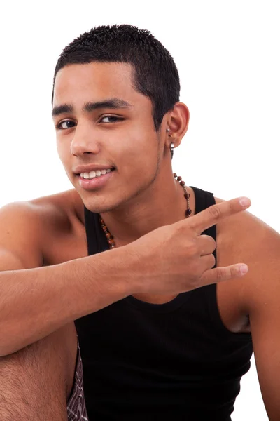 Homem latino jovem com polegares levantados como sinal legal, isolado no fundo branco. estúdio tiro — Fotografia de Stock