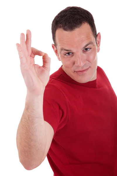 발생 확인의 표시로 손가락으로 잘생긴 남자는 흰색 배경에 고립. 스튜디오 촬영 — 스톡 사진