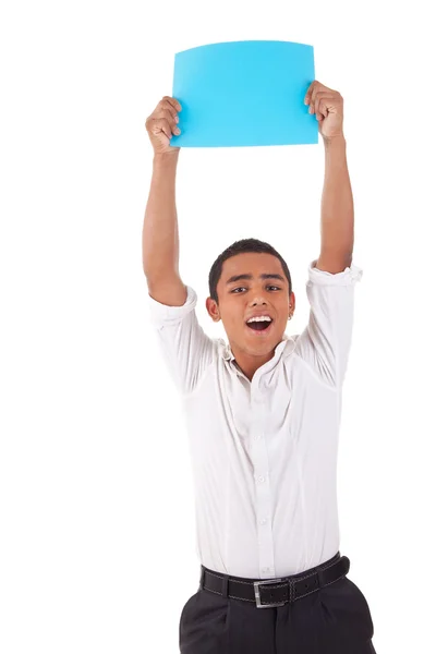 Happy young latino man, raised arms with blue card in hand, isolated on white background. Studio shot. — Stock Photo, Image