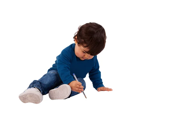 Piękne i szczęśliwe dziecko pisania na podłodze, na białym tle, łapka — Zdjęcie stockowe