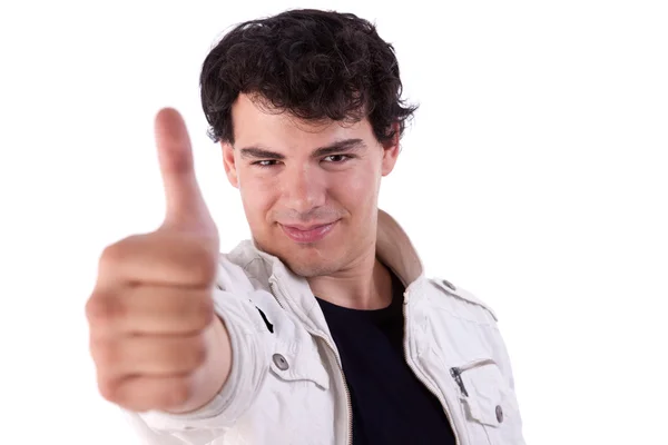 Young man smiling, with thumb up, isolated on white, studio shot — Stock Photo, Image