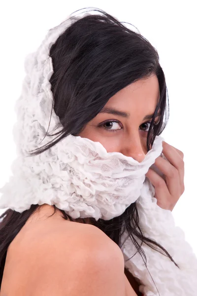 Beautiful woman covering her face with a white handkerchief, isoated on white, studio shot — Stock Photo, Image
