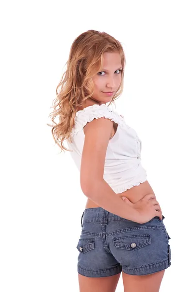 美しく、エレガントな若い女性のショート パンツ、見返しに分離白スタジオ ショット — ストック写真