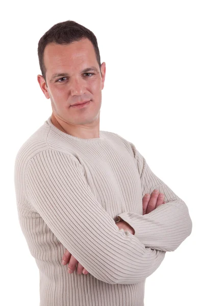 Portret van een knappe man, met gekruiste, op witte achtergrond armen. studio opname — Stockfoto
