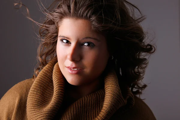 Beautiful woman with hair on wind, studio shot — Stock Photo, Image
