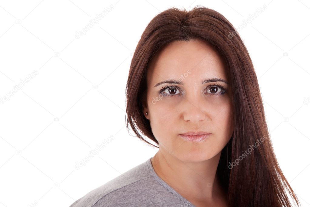 Beautiful and serious middle-age woman, on white, studio shot