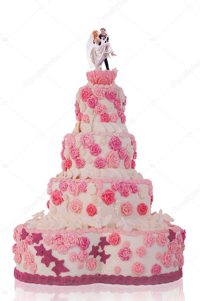 Beautiful wedding cake, with pink roses. isolated on white background