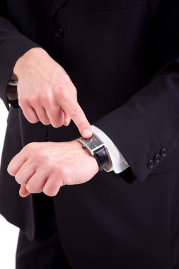 Businessman pointing to the watch clipart