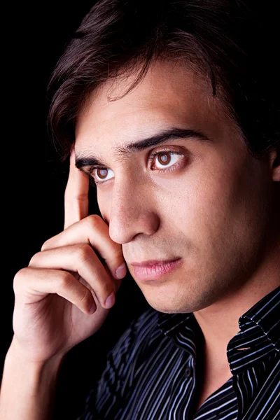 Portret przystojnego młodego mężczyzny myślącego — Zdjęcie stockowe