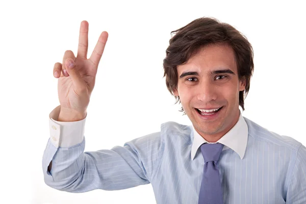 Young bussiness man with arm raised in victory sign — Stock Photo, Image