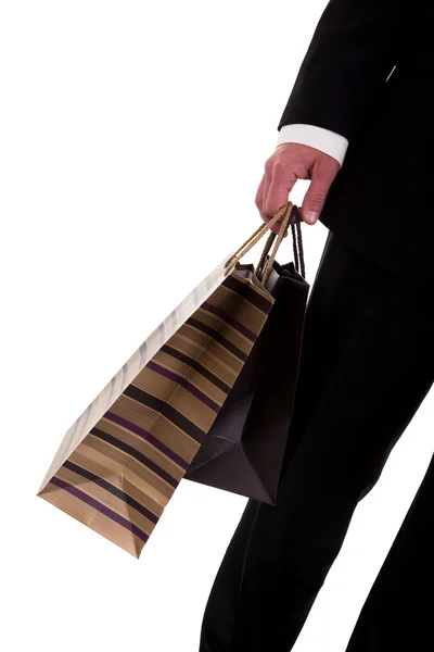 Detalj av en man som gör shopping, med väskor — Stockfoto