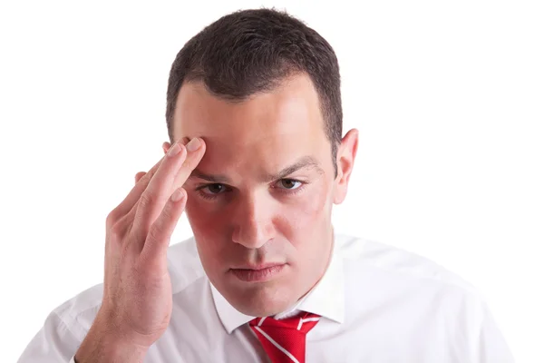Mann mit Kopfschmerzen auf weißem Hintergrund. Studioaufnahme. — Stockfoto