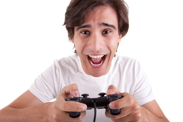 stock image Handsome man, playing with gamepad, isolated on white background. Studio shot