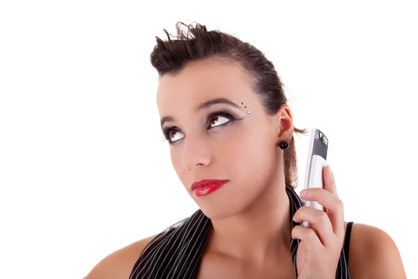 Schöne Frau gelangweilt am Telefon, isoliert auf weißem Hintergrund. Studioaufnahme. — Stockfoto