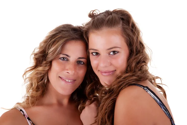 Happy mother and daughter embraced, isolated on white. Studio shot — Stock Fotó