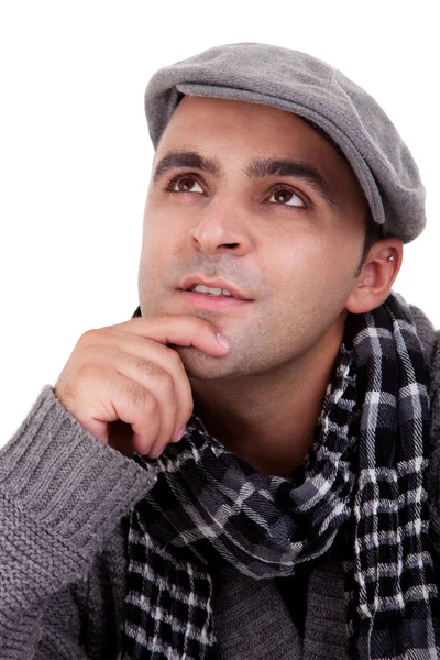 Portret młodego mężczyzny, myślenia, w jesienne i zimowe ubrania, na białym tle. łapka — Zdjęcie stockowe