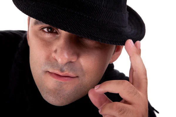 Portret van een man met zijn zwarte hoed, geïsoleerd op wit. studio opname — Stockfoto