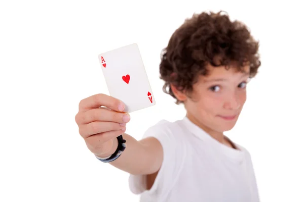 Cute boy showing an ace of hearts, isolated on white, studio shot — Stock Photo, Image