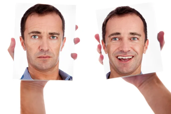 Un hombre, con dos caras en el espejo, aislado en blanco, plano de estudio —  Fotos de Stock