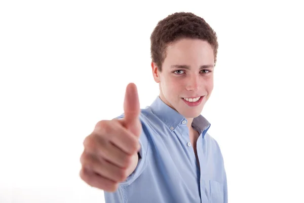 Молодий чоловік посміхається, з великим пальцем вгору, ізольований на білому, студійний знімок — стокове фото