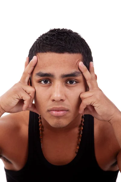 Young and handsome latin man, with hands holding the face isolated on white, studio shot — Stock Photo, Image