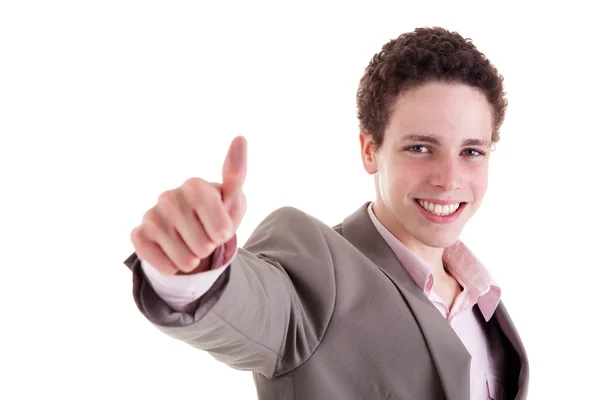 Junger Mann lächelnd, mit erhobenem Daumen, isoliert auf weiß, Studioaufnahme — Stockfoto