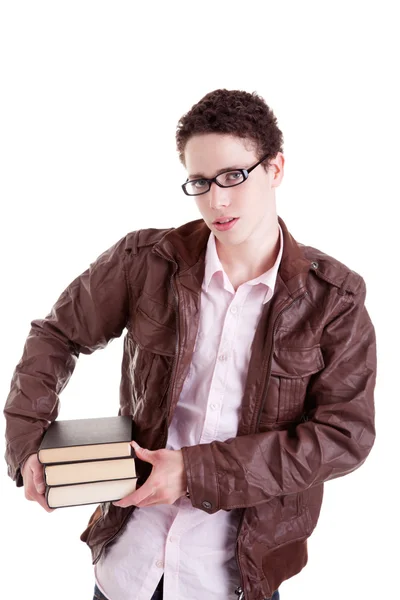 Mladý a krásný kluk s knihami na rukou, izolovaných na bílém pozadí. Studio záběr — Stock fotografie