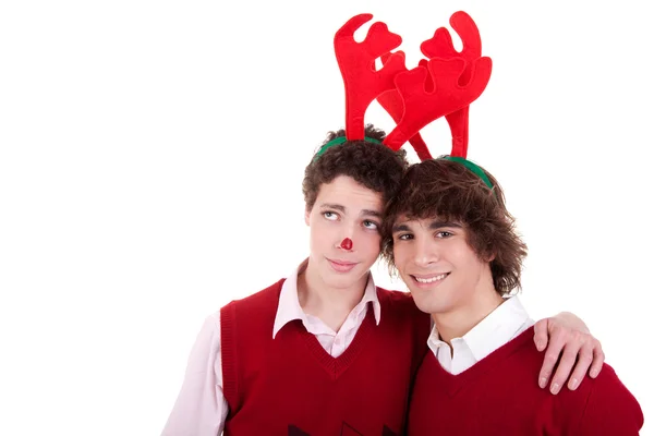 Happy young men wearing reindeer horns, on white, studio shot — Stock Photo, Image
