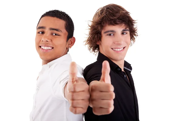 Два молодих чоловіка різних кольорів, з великим пальцем вгору, ізольовані на білому, студійний знімок — стокове фото