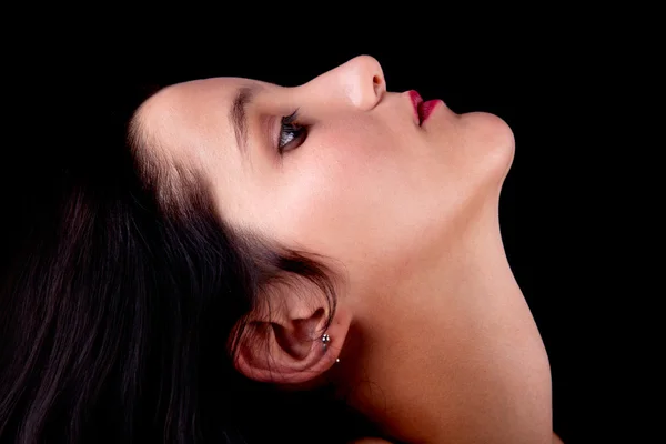 Beautiful woman profile, isolated on black, studio shot — Stock Photo, Image