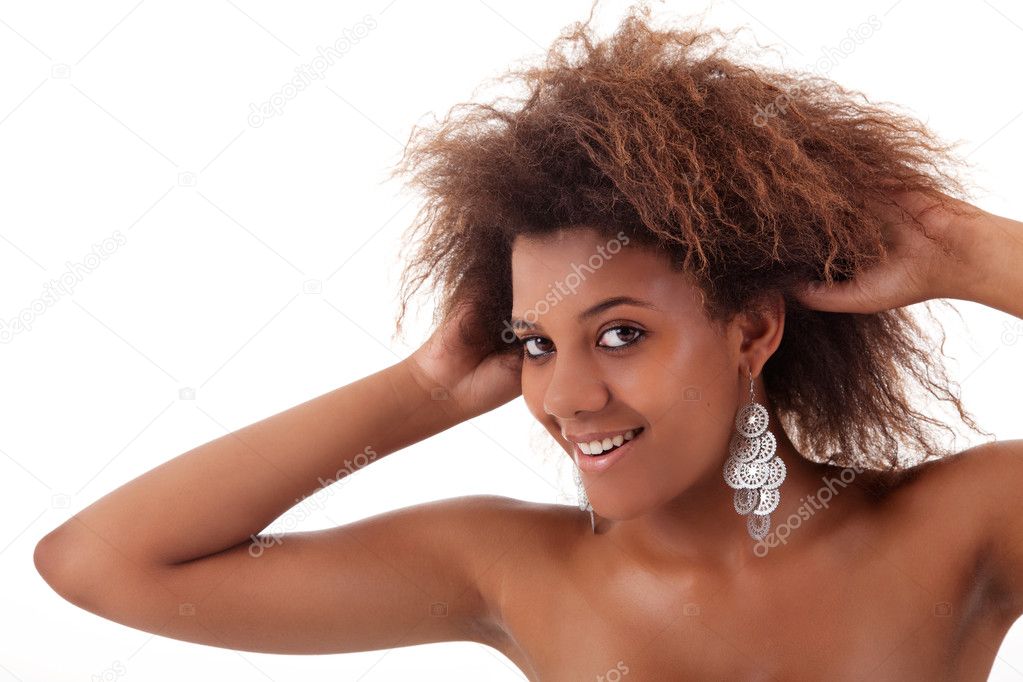 Beautiful black woman, holding her hair with his hands, isolated on white background