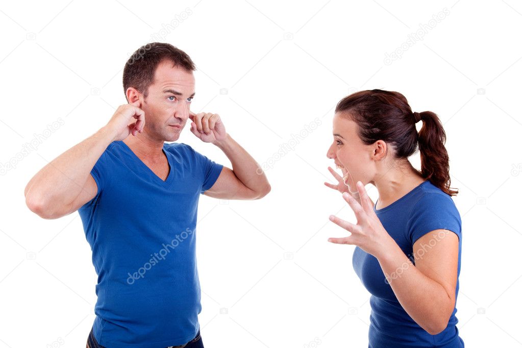 Woman screaming with a man, him with hands covering his ears , isolated on white, studio shot
