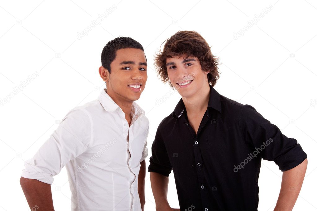 Friends: two young man of different colors,looking to camera and smiling, isolated on white, studio shot