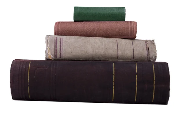 La pile vieux types de livres avec côté isolé sur blanc — Photo
