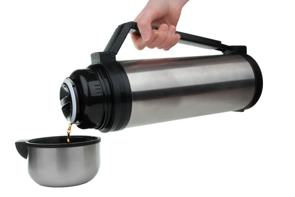 Pouring tea from thermos — Stock Photo, Image