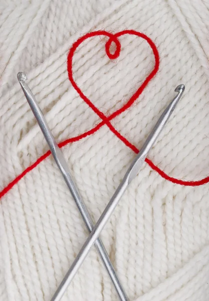 Heart from a woolen string — Stock Photo, Image
