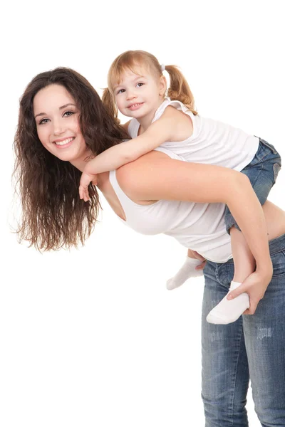 Feliz madre e hija jugando sobre el fondo blanco — Foto de Stock