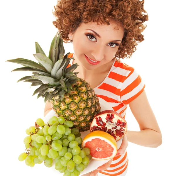 Mujer divertida con frutas jugosas en el fondo blanco —  Fotos de Stock