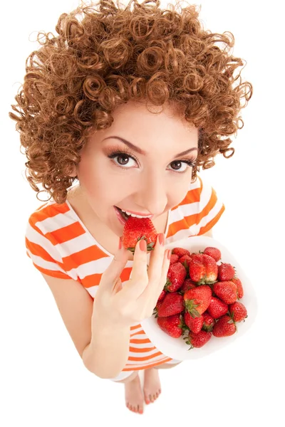 Mujer divertida con fresa en el fondo blanco —  Fotos de Stock