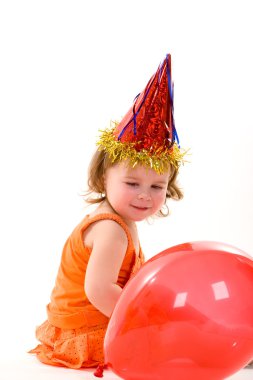mutlu kız renkli balonlarla oynamayı